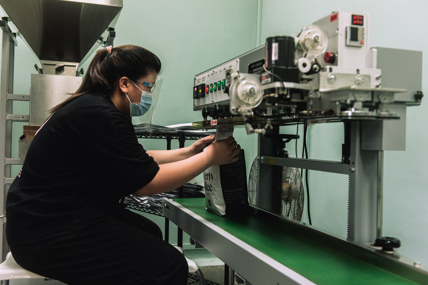 Coffee being sealed by a operation staff