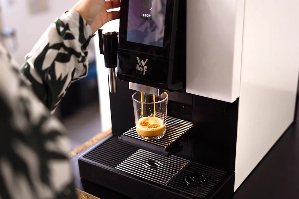 Brewing coffee in office with WMF machine