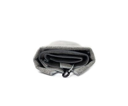 Grey barista clip cloth with a durable metal clip, designed for easy attachment to aprons or belts. Perfect for quickly wiping espresso machine steam wands and keeping workstations clean.